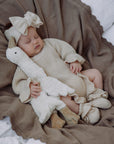 Ruffle Romper | Almond
